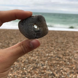 A holey stone, everyone around here has one somewhere in their house, actively practising magic or not the feeling that it’s special and the impulse to take it home is strong.